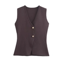 Close-up of V-neck knitted vest with gold buttons and textured chocolate fabric - S / Vest / Chestnut