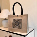 Linen tote bag with vintage black floral print and woven handles in beige finish - Square Floral