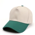 Detail of five-panel baseball cap showing beige crown, green brim, and cotton texture - Adjustable / Beige/Deep Green