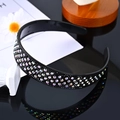 Detail view of the black headband showing multi-row colorful rhinestones and inner comb teeth - Big Deep Black Rhinestone