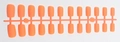 Detailed view of 24 pieces orange matte long coffin fake nail tips on a plastic runner frame - Orange