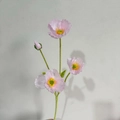 Single stem of artificial poppy flowers in soft pink with detailed yellow stamens - All Pink
