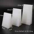 Three-piece set of white frosted acrylic trapezoid display stands for jewelry pendants - White 3-Piece Set