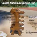 Golden Sandalwood massaging comb with fish-shaped design for scalp and body meridian care - Golden Sandalwood 7-Tooth Fish Massage Comb