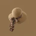 Camel straw sun hat featuring a dark brown floral ribbon and decorative bow detail - Adjustable / Khaki-Gold Thread Cloth Bow