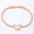 Détails du bracelet tennis papillon doré avec zircons, longueur 19,5 cm et poids de 6,2 g - Or (Zirconium Blanc & Coquille)