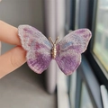Macro shot of embroidered butterfly brooch with purple gradient wings and gold metal body - Embroidered Purple Butterfly