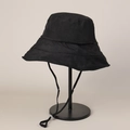 Detailed view of a professional black quick-dry bucket hat with wide brim and chin strap - M(56-58cm) / Black
