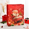 Grande sacchetto regalo di Babbo Natale rosso con illustrazione e manici in corda - Babbo Natale sulla Slitta / Medio (12 pezzi)
