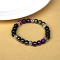Natural tiger eye bracelet with black and purple beads featuring silver embossed spacers - 19cm/8mm Bead Diameter / Purple Tiger Eye