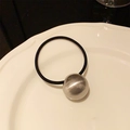 Minimalist black elastic hair tie with a large brushed silver metal bead charm - Brushed Circle / Silver