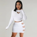 Detail of white ribbed knit two-piece set featuring rhinestone heart cutout design - S / White