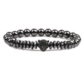 Detailed view of dark grey beaded bracelet featuring a leopard head with green eyes - Black Leopard Head With Rhinestones