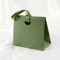 Elegant avocado green gift bag with premium leather texture and smooth satin ribbon handles - 15.5*14.5*7.5cm / Grass Green