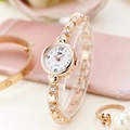 Montre à quartz élégante en or rose pour femme avec maillons cœur en cristal et cadran blanc - Bracelet Or Rose Cadran Blanc