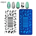 Détails de motifs de papillons et dentelle sur la plaque de stamping nail art OMJ-05 - Style Dentelle Papillon (OMJ-05)