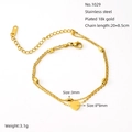 Macro shot of 18K gold plated stainless steel double layer heart anklet and small beads - Heart Style