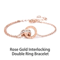 Détails du bracelet double anneau romain en or rose avec des pierres scintillantes - Bracelet double anneau romain / Or rose
