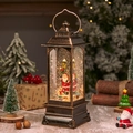 Vintage bronze Santa Claus snow globe lantern with swirling glitter and warm glow - Rotating Lantern Santa Streetlight