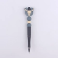 Western style beadable pen featuring a grey longhorn skull and horseshoe silicone charm - Gray Bull