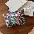 Close-up of small floral fabric pouch with simple wish label on rustic wooden table - Green Base Pleated Oil Painting Orange Red Floral