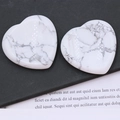 Polished white marble crystal heart massage stones with natural grey veining, pair of two - Howlite