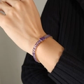 Elegante armband met paarse zirkonia-stenen en een gouden zetting voor dames - 15+5cm / Paarse Armband