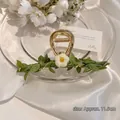 Floral hair claw clip with green leaves and white daisy flower, golden metal finish - Flower Vine Claw Single Daisy