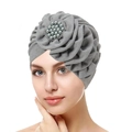 Detailed view of gray turban hat with pleated fabric and elegant pearl embellishment - Light Gray