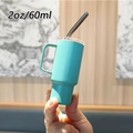 Detailed view of a mini 2oz bright blue stainless steel espresso tumbler with straw - 2oz/60ml / Cyan