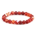 Close-up of red agate beaded bracelet showing natural stone textures and polish - Red Striped Agate