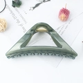 Translucent sage green triangle hair claw clip with golden spring on aesthetic background - Jelly Grey Green