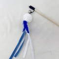 Interactive wooden cat wand with blue feathers and sisal ball on a plush surface - Blue Tassel Ball