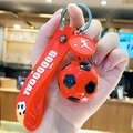 Oranger Fußball-Schlüsselanhänger mit GOOOOAL-Gummiband und Metall-Athlet-Anhänger - Rot