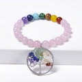 Detail of colorful chakra beads and Tree of Life pendant on a pink beaded bracelet - Rose Quartz Bracelet