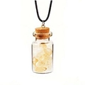 Detail view of mini glass bottle pendant with yellow crushed stones and black cord necklace - Citrine