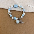 Blue and white beaded bow bracelet with silver flower and leaf charms for women - Light Blue-Leaf