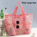 Pink large mesh beach bag with multi-pocket storage and reinforced webbing handles - Large / Pink