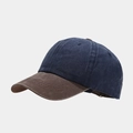 Detail of vintage washed baseball cap with navy crown and brown curved brim - Navy + Brown Brim