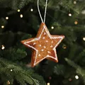 Gingerbread style star Christmas ornament with white frosting and sequins, 12cm size - Pentagram