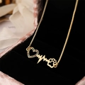 Gold plated heart necklace with zircon heartbeat and paw print pendant in a gift box - Heartbeat Pet Paw Necklace