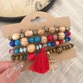 Bohemian multi-layer sandalwood bead bracelet with red tassel and gold tree of life charm - Red