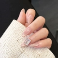Elegant emerald cut clear crystal ring with natural nude almond shaped press-on nails - By1541 Ice Curling Autumn Moon / Glue Type