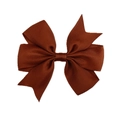 Detail of a dark brown grosgrain ribbon bow hair clip with clear ribbed texture - Coffee