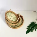 Three-piece nesting woven rattan trays with green floral base and wood handles - Starfruit / Three-Piece Set