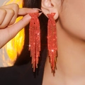 Elegant red rhinestone long tassel earrings for women shown on a model for party wear - Red Evening Party Long Tassel
