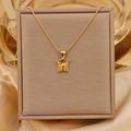 Detail view of the golden 18K titanium steel butterfly pendant with yellow zircon stones - Gold + Yellow (Bead Chain)