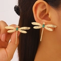 Detailed close-up of a dragonfly stud earring featuring green gemstone and golden wings - Green Dragonfly Studs (11012) / Gold Emerald Green Gemstone