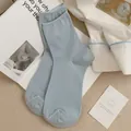 Minimalist light blue cotton crew socks with vertical ribbed knit and elastic cuffs - One Size / Pale Blue