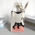 Minimalist knit handbag with black cat and red ball pattern in cream white fabric - Beige